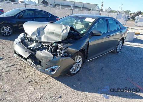2014 Toyota Camry Xle z USA, uszkodzony, nr VIN 4T4BF1FK7ER397973